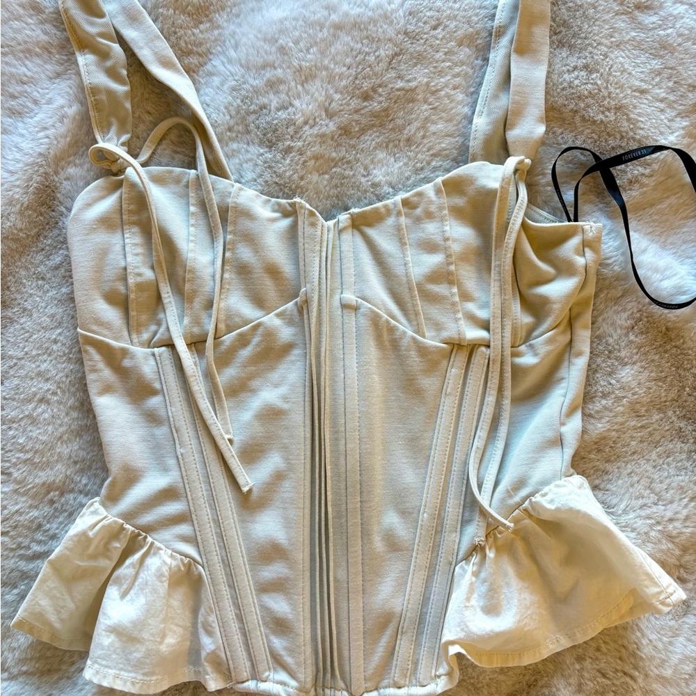 Forever 21 Cream Peplum Bodysuit